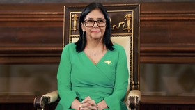 This handout picture released by the Miraflores Palace press office shows Venezuela's Vice-President Delcy Rodriguez gesturing during an oath ceremony to be sworn in as Venezuela's interim President at the National Assembly in Caracas on January 5, 2