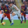 Soccer Football - Spanish Super Cup - Final - FC Barcelona v Real Madrid - King Abdullah Sports City Stadium, Jeddah, Saudi Arabia - January 11, 2026  Real Madrid's Kylian Mbappe in action with FC Barcelona's Lamine Yamal REUTERS/Stringer