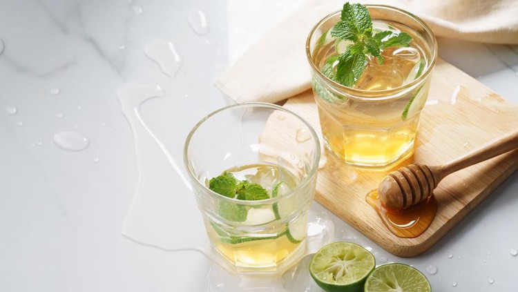 Ilustrasi jeruk nipis dan madu