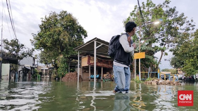 Pemkab Tangerang kerahkan tim medis untuk 50 ribu warga terdampak banjir. Banjir merendam 18 titik, ancam 108 hektare sawah gagal panen.