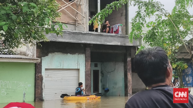 Banjir di Perumahan Taman Cikande, Tangerang, mulai surut setelah 6 hari. Sebagian pengungsi kembali ke rumah, sementara 17 keluarga masih di posko.