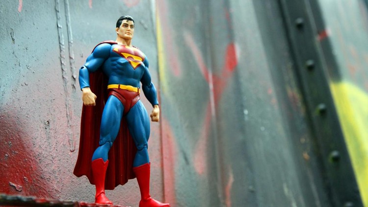 Whistler&comma; Canada - June 15&comma; 2013&colon; An action figure model of Superman&comma; sculpted by Paul Harding and released by DC comics&comma; against a bent metal&period;
