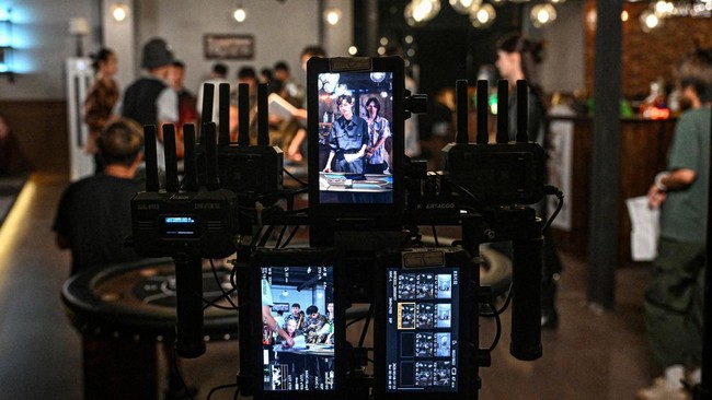 The photo taken on October 10, 2025 shows the monitor screens at a microdrama film studio in Shanghai. Ultra-short video series 