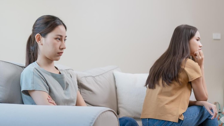 Unhappy asian girl couple&period; Homosexual love trouble&period; LGBT Lesbian girlfriends out of love&period; Lesbian women quarreling&period; young woman relationship problem&period; Unmatched love opinions&period;