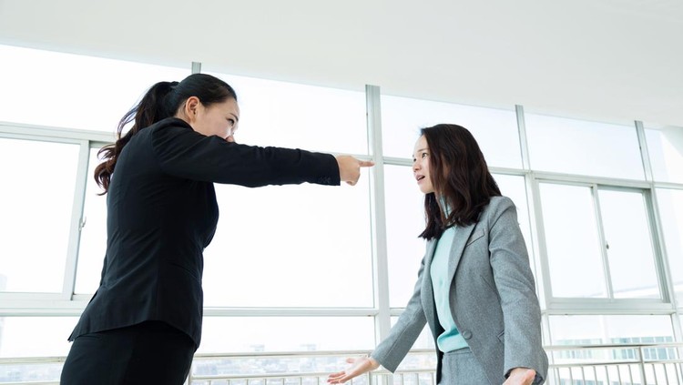 Two businesswomen arguing in office&period;