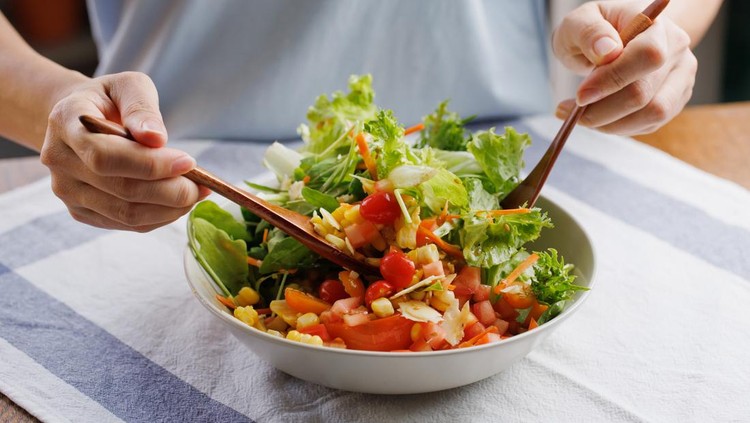 Ilustrasi makan sayur