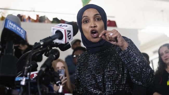 Rep. Ilhan Omar, Democrat from Minnesota, speaks to the press in Minneapolis, Minnesota, on January 28, 2026. On January 27, 2026, a man sprayed Omar with a syringe of unknown liquid at a town hall meeting, where she called for curbing the Trump admi