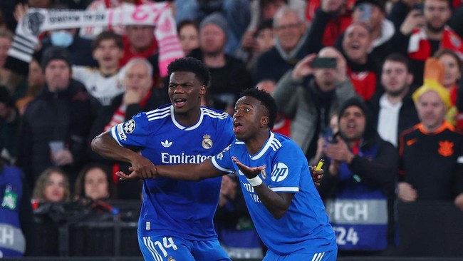 Gelandang Real Madrid, Tchouameni, mengungkap Vinicius Junior menjadi korban rasisme oleh pemain Benfica. Insiden terjadi saat Liga Champions 2025/2026.