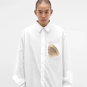 Kemeja dengan Cap Setrika Gosong Kini Jadi Baju Mewah, Kok Bisa?