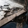 The debris at the doorway of a mosque, which Palestinians say was damaged by Israeli settlers, in West Bank village of Surra, near Nablus in the Israeli-occupied West Bank, February 23, 2026. REUTERS/Mohamad Torokman