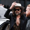 British actor and comedian Russell Brand arrives at Southwark Crown Court after further charges were added to his rape and multiple sexual assault case, in London, Britain, February 24, 2026. REUTERS/Toby Melville     TPX IMAGES OF THE DAY