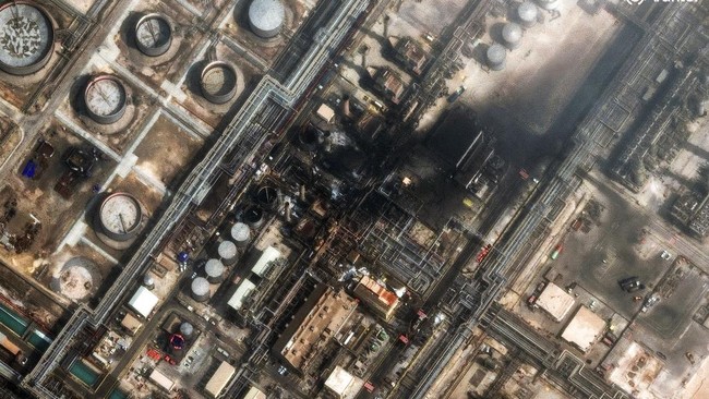 This handout satellite image courtesy of Vantor taken and released on March 2, 2026, shows damage at the Saudi Aramco's Ras Tanura refinery. Saudi Arabia's military raised its readiness levels after multiple attacks by Iran, a source close to the arm