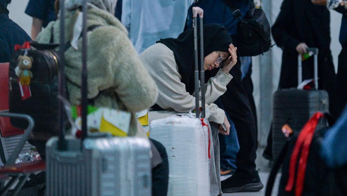 FOTO: 22 WNI dari Iran Tiba di Bandara Soekarno Hatta