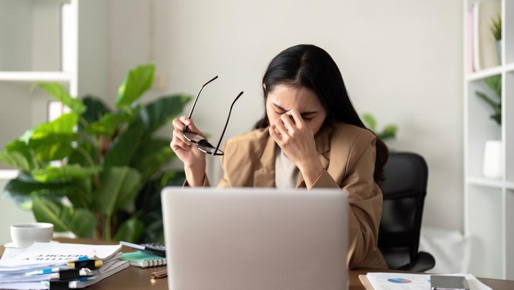 Eco friendly&comma; businesswoman young asian stress in working on laptop while sitting at home office&period;