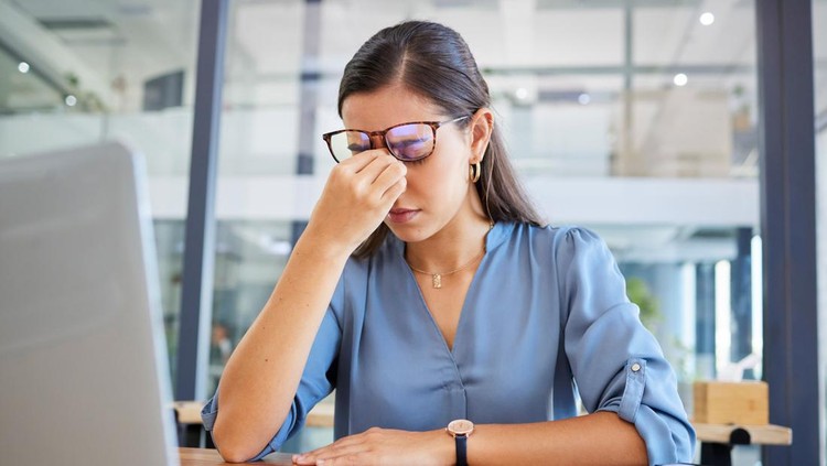 Stress headache&comma; burnout and woman in office overwhelmed with workload at desk with laptop&period; Frustrated&comma; overworked and tired woman with computer at startup&comma; anxiety from deadline time pressure crisis