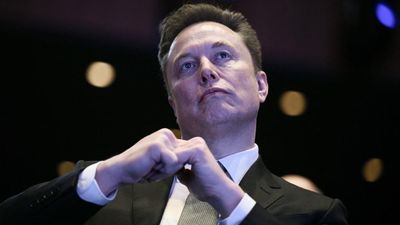(FILES) Elon Musk looks on as US President Donald Trump speaks at the US-Saudi Investment Forum at the John F. Kennedy Center for the Performing Arts in Washington, DC on November 19, 2025. Tech tycoo