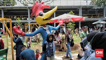 FOTO: Bernostalgia di Taman Woody Saat Libur Lebaran