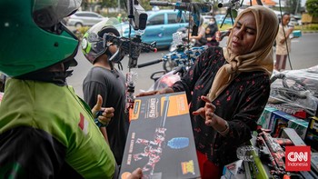 FOTO: Menghabiskan 'Angpao' Lebaran di Pasar Gembrong