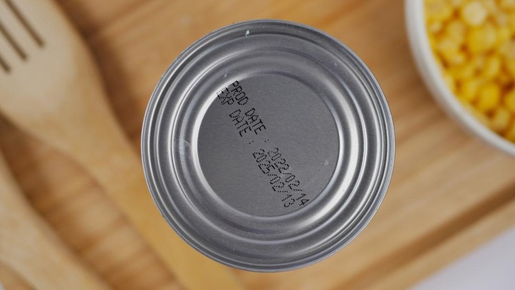 expire date on food can on white background