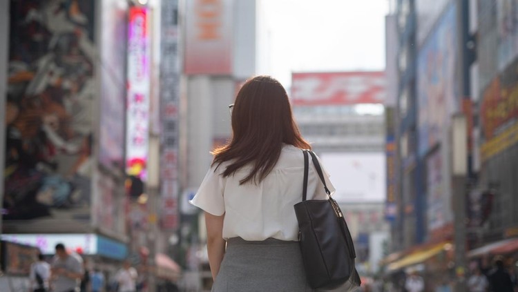 Woman walking in Akihabara&comma; famous tourist spot in Japan