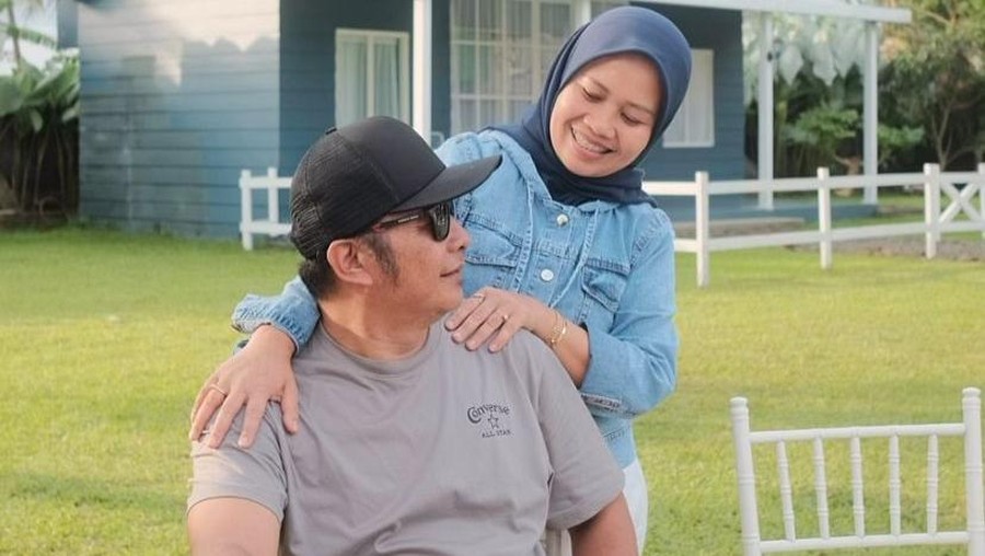 Rini Perdiyanti dan Suami