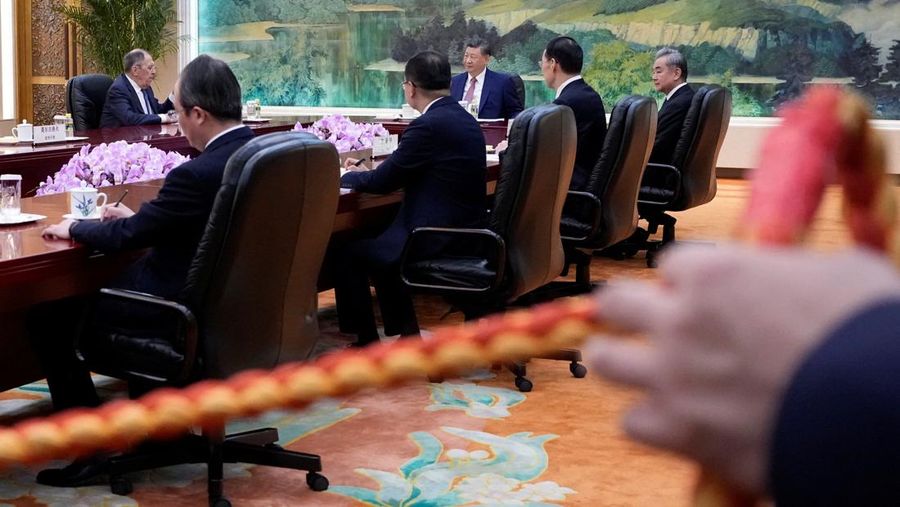 Russia’s Foreign Minister Sergei Lavrov walks for a meeting with China’s President Xi Jinping at the Great Hall of the People in Beijing, China April 15, 2026. Iori Sagisawa/Pool via REUTERS