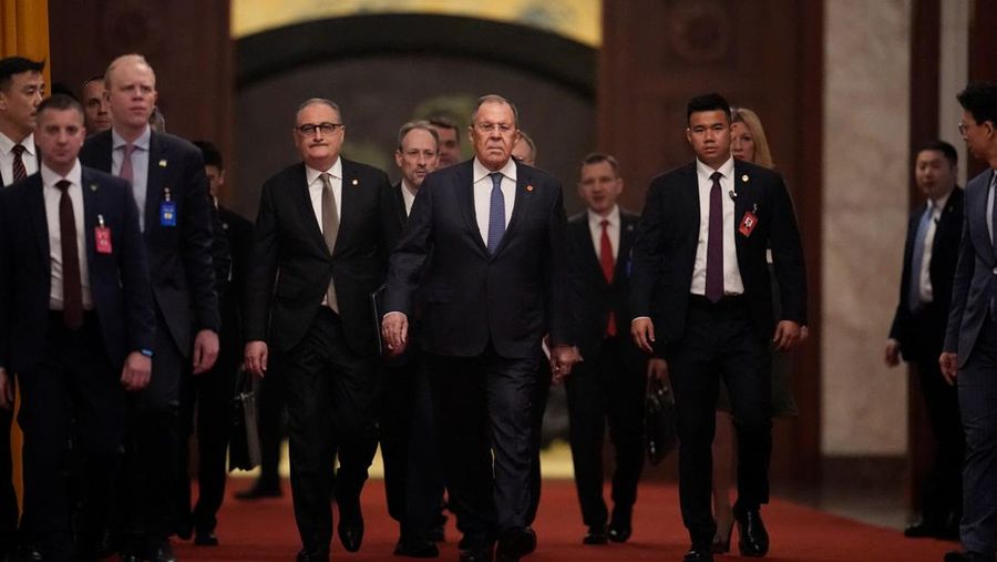 Russia’s Foreign Minister Sergei Lavrov walks for a meeting with China’s President Xi Jinping at the Great Hall of the People in Beijing, China April 15, 2026. Iori Sagisawa/Pool via REUTERS