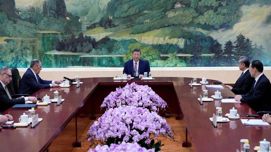 Russia’s Foreign Minister Sergei Lavrov walks for a meeting with China’s President Xi Jinping at the Great Hall of the People in Beijing, China April 15, 2026. Iori Sagisawa/Pool via REUTERS