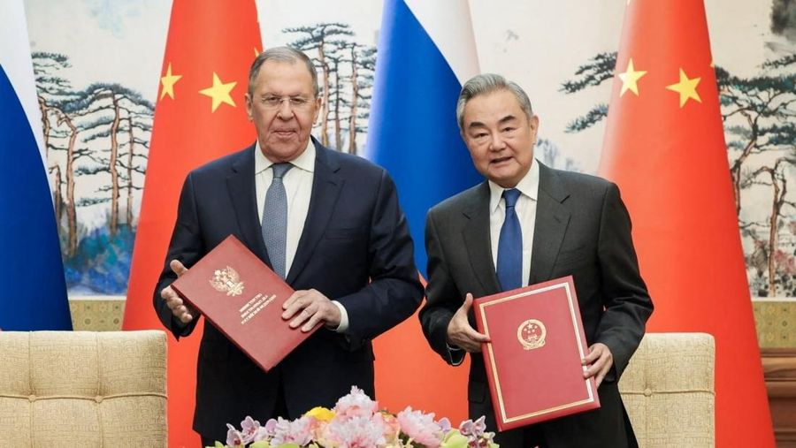 Russia’s Foreign Minister Sergei Lavrov walks for a meeting with China’s President Xi Jinping at the Great Hall of the People in Beijing, China April 15, 2026. Iori Sagisawa/Pool via REUTERS