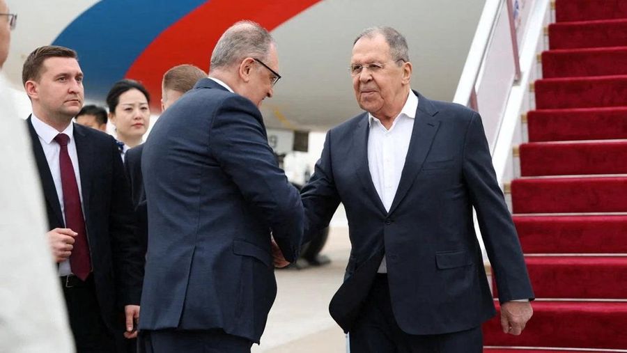 Russia’s Foreign Minister Sergei Lavrov walks for a meeting with China’s President Xi Jinping at the Great Hall of the People in Beijing, China April 15, 2026. Iori Sagisawa/Pool via REUTERS
