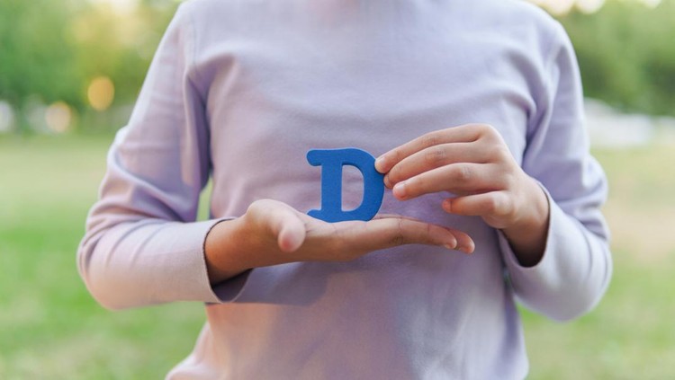 Child Holding Letter 