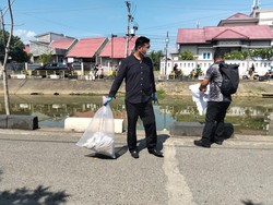 Pasukan Oranye Temukan Janin 6 Bulan saat Bersihkan Sungai di Banda Aceh