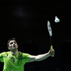 Frances Christo Popov hits a return to Denmarks Anders Antonsen during their mens singles final match of the Badminton European Championships' finale at the Carolina Marin Sports Palace in Huelva on April 12, 2026. (Photo by Cristina Quicler / AFP) /