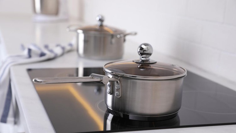 New clean pot on cooktop in kitchen