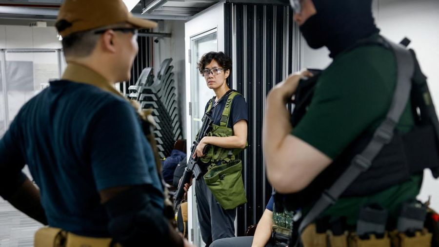 Warga sipil di Taiwan semakin gencar mengikuti training bela diri. Fenomena ini terjadi di tengah sorotan terhadap pertemuan Presiden AS Donald Trump dan Presiden China Xi Jinping. (REUTERS/Ann Wang)