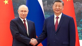 Disambut Hangat Xi Jinping dengan Jabat Tangan Erat, Ini Kata Putin