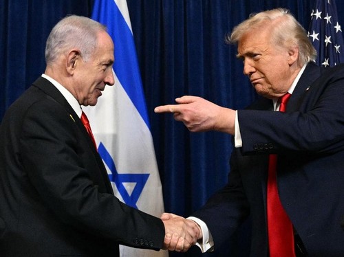 US President Donald Trump (R) and Israeli Prime Minister Benjamin Netanyahu shake hands as they arrive to speak to journalists during a joint press conference at Trumps Mar-a-Lago residence in Palm Beach, Florida, on December 29, 2025. US President D