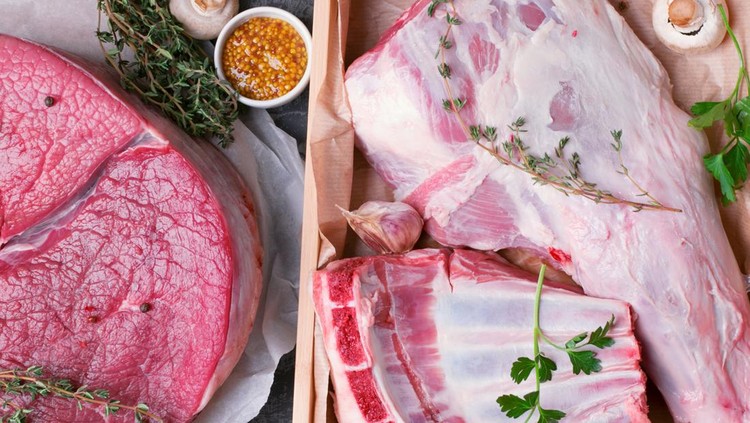 Raw meat assortment and spices&period; Mutton ribs&comma; leg and veal&period; Top view