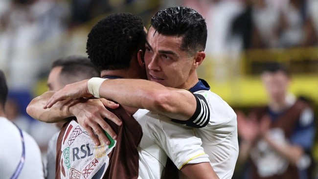 Nassr's Portuguese forward #07 Cristiano Ronaldo celebrates after winning the title of Saudi Pro League football match against Damac at the Al-Awwal Park Stadium in Riyadh on May 21, 2026. (Photo by Fayez NURELDINE / AFP)