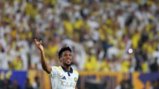 Nassr's French forward #21 Kingsley Coman celebrates after scoring his team's second goal during the Saudi Pro League football match between Al-Nassr and Damac at the Al-Awwal Park Stadium in Riyadh on May 21, 2026. (Photo by Fayez NURELDINE / AFP)