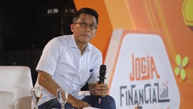 Ketua Komisi XI DPR RI, Mukhamad Misbakhun saat menyampaikan pemaparan dalam Jogja Financial Festival 2026 di Jogja Expo Center (JEC), Yogyakarta, DIY, Sabtu (23/5/2026). (CNBC Indonesia/Faisal Rahman)