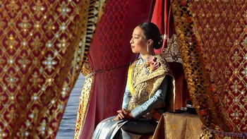 This handout picture taken and released by Thai Royal Household Bureau on December 12, 2019 shows Thailand's King Maha Vajiralongkorn's daughter Princess Bajrakitiyabha sits in her barge during the Royal Barge procession in Bangkok. The Royal barge p