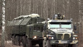 (FILES) This grab from a handout footage released by the Russian Defence Ministry press service on December 30, 2025, shows what is said is deployment of a Russian Oreshnik hypersonic, nuclear-capable missile system for combat duty at an undisclosed