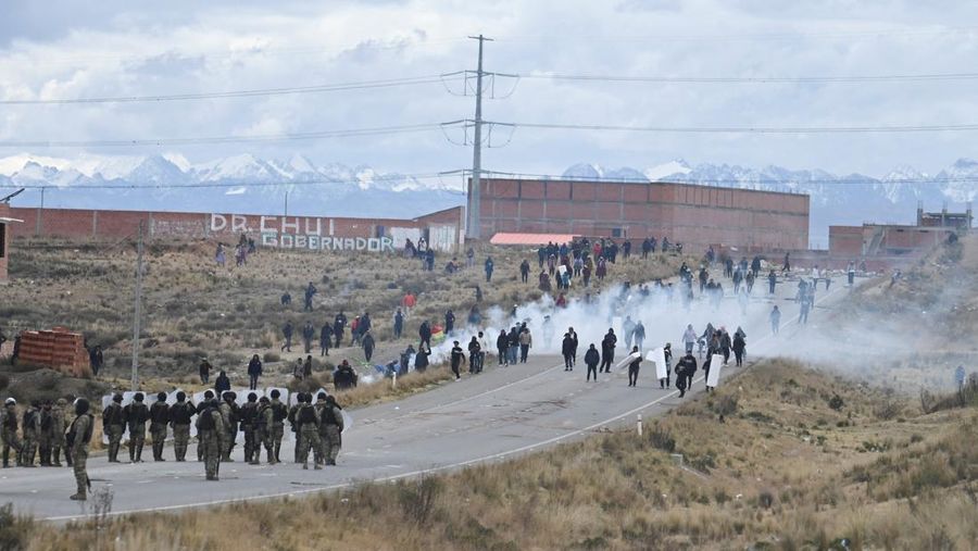 Security forces use tear gas during nationwide protests aiming to press Bolivian President Rodrigo Paz's government to roll back austerity measures and address rising costs of living, in Apacheta, Bolivia, May 23, 2026. REUTERS/Claudia Morales