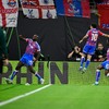 Crystal Palace's French striker #14 Jean-Philippe Mateta (L) celebrates scoring the opening goal 1-0 with his teammates during the UEFA Conference League final football match between Crystal Palace FC and Rayo Vallecano de Madrid in Leipzig, Germany,