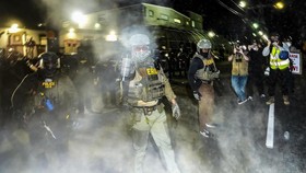 An Enforcement and Removal Operations (ERO) agent deploys a chemical irritant outside Delaney Hall in Newark, New Jersey, U.S., May 28, 2026. REUTERS/Ryan Murphy
