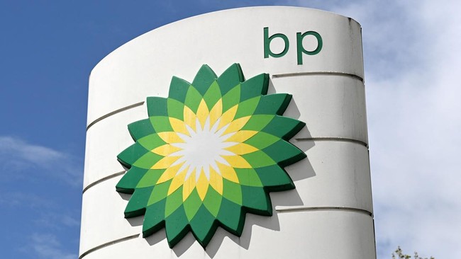 BP logos are pictured at a BP petrol and diesel filling station in north London on May 12, 2021. London-listed BP had suffered a vast $20.3-billion net loss last year, when the pandemic shuttered swathes of the global economy and slammed energy deman