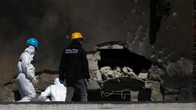 Romanian law enforcement officers work on the site of an explosion at a residential block of flats following a drone hit close to the border with Ukraine, in Galati, Romania, May 29, 2026. Inquam Photos/George Calin via REUTERS