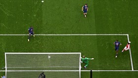 Arsenal's German midfielder #29 Kai Havertz scores the opening goal past Paris Saint-Germain's Russian goalkeeper #39 Matvey Safonov during the UEFA Champions League final football match between Paris Saint-Germain (PSG) and Arsenal FC at the Puskas
