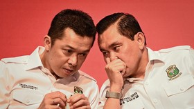 Taufik Hidayat (kiri) berharap pemain Indonesia termotivasi saat tampil di Indonesia Open 2026.